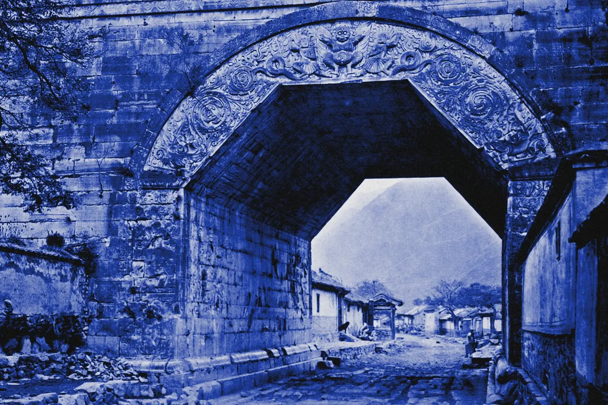 Illustration: ANCIENT BUDDHIST ARCH AT KEW-YUNG-KWAN, NANKOW PASS, from a nineteenth-century photograph (1898), redrawn as a blue blue pencil duotone.