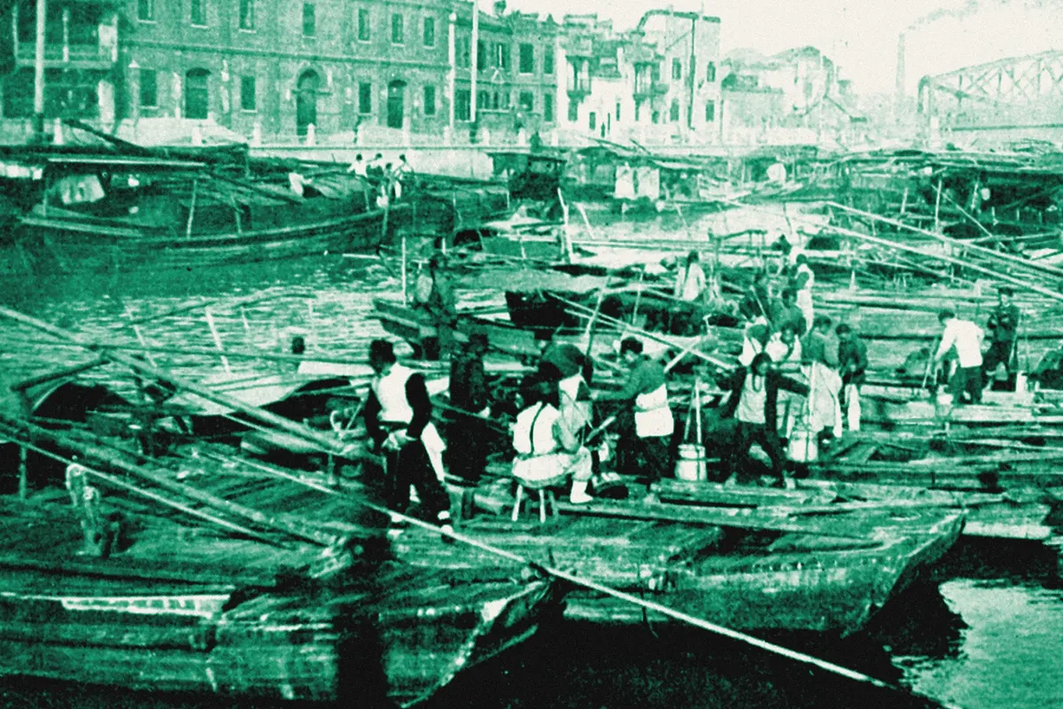 Illustration: Farmers of forty centuries - manure boats on Soochow creek, Shanghai, China, from a period photograph (1911), redrawn as a jade blue pencil duotone.