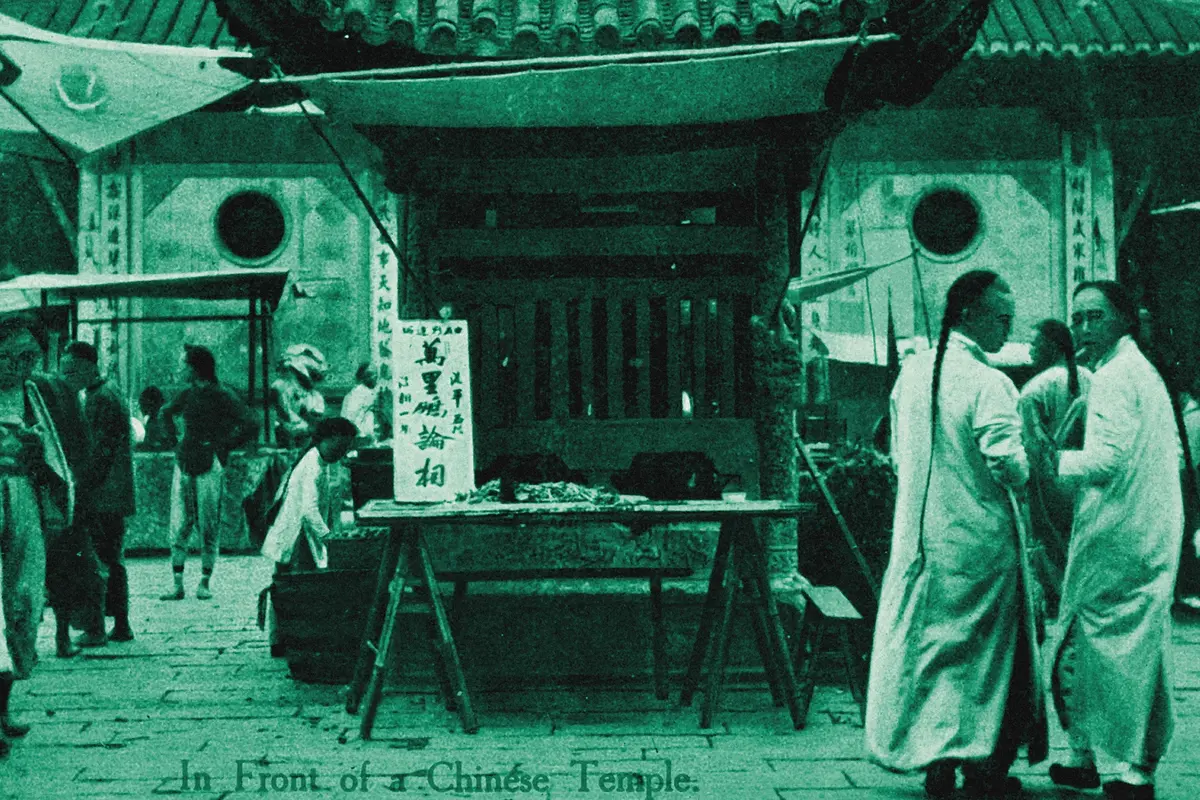 Illustration: In front of a Chinese temple, from a period photograph (1910), redrawn as a jade blue pencil duotone.