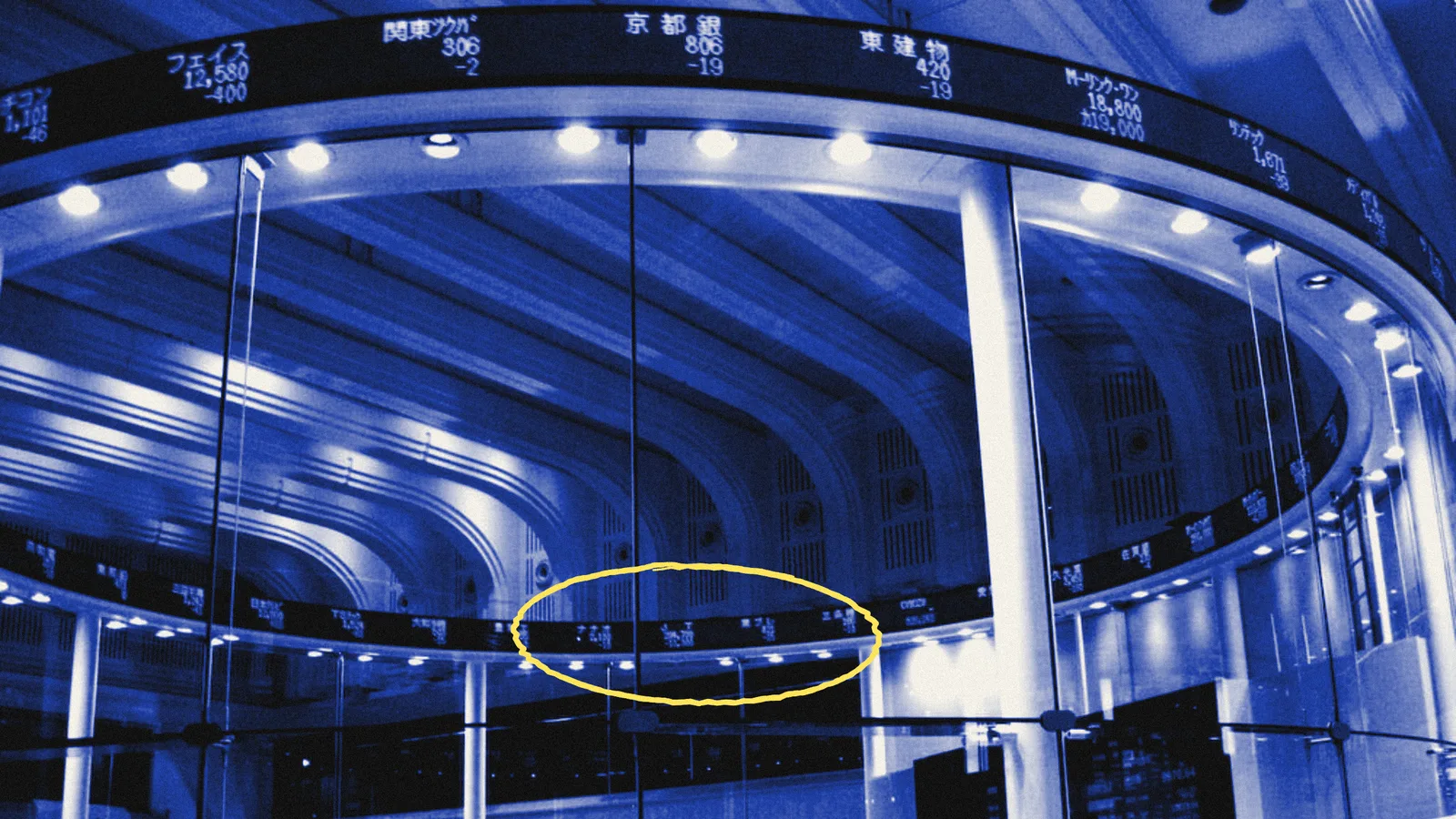 Photo illustration: the market centre of the Tokyo Stock Exchange in blue duotone, one share price on its ticker ring circled in yellow pencil.