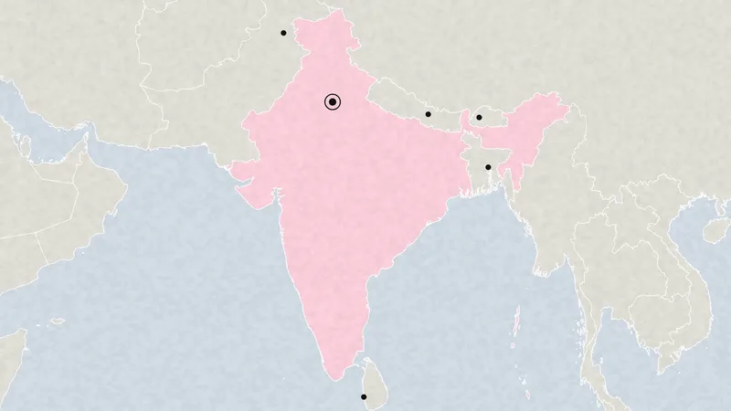 Illustration: a map of South Asia with India tinted pink and the capitals marked.